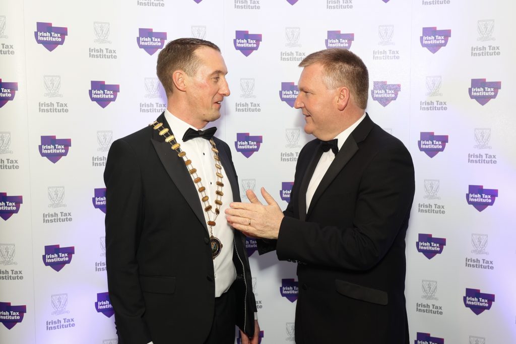 Institute President, Colm Browne, discussing the Irish economy with Minister for Finance, Michael McGrath, at Annual Dinner 2023
