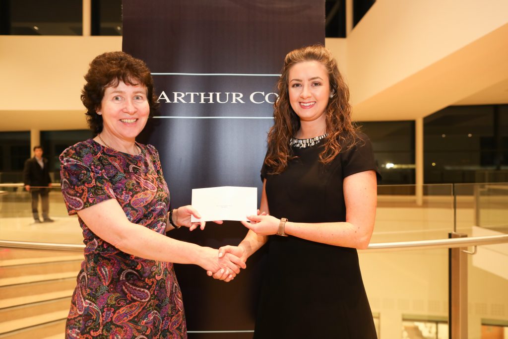 Claire Doyle receiving the prize for the Professional Skills Award for Part 2 from Anne Corrigan, Barrister, Arthur Cox.