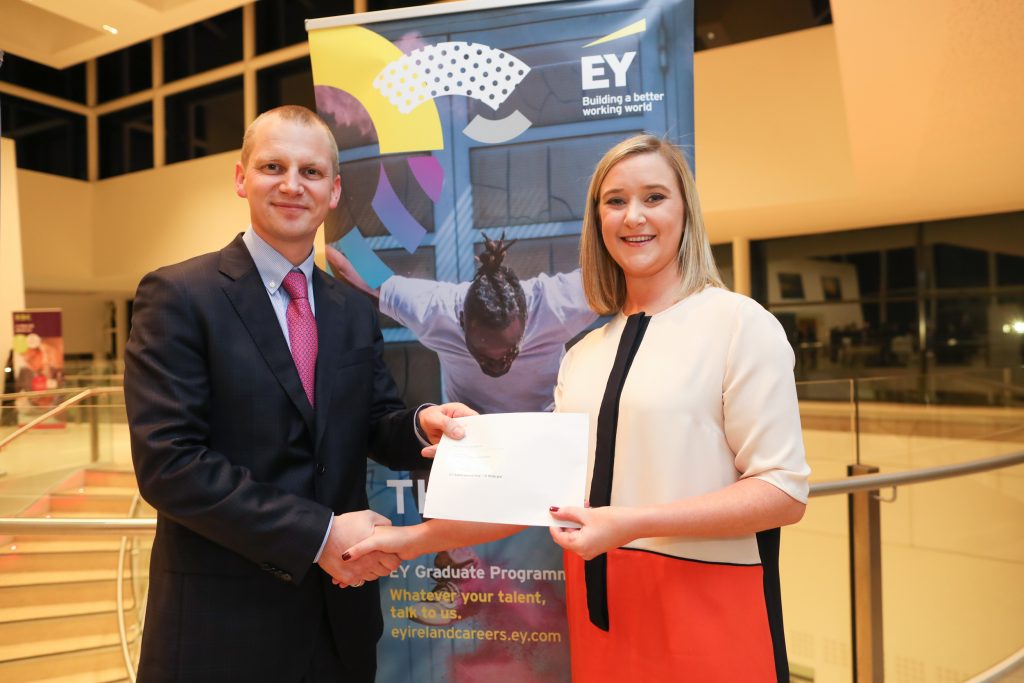 Kate Feeney receiving the prize for 1st Place in Irish Tax Institute Associateship Examination, Part 2, August 2018 from Ian Collins, Partner, EY.