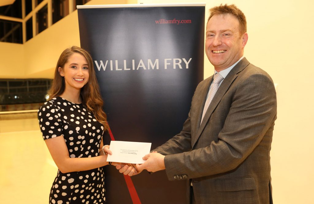 Claire McCarthy receiving the prize for the Professional Skills Award for Part 3 from Shane Wallace, Tax Partner, William Fry.