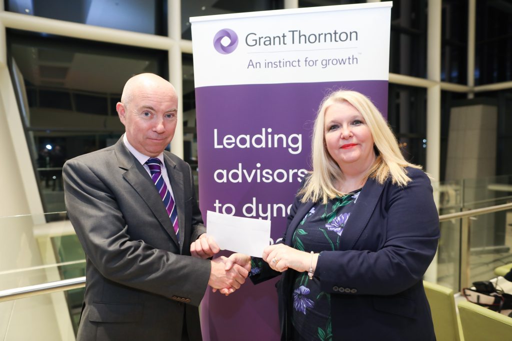 Cecilia Kelly receiving the prize for 1st Place in Irish Tax Institute Associateship Examination, Part 1, August 2018 from Michael McGivern, Grant Thornton.