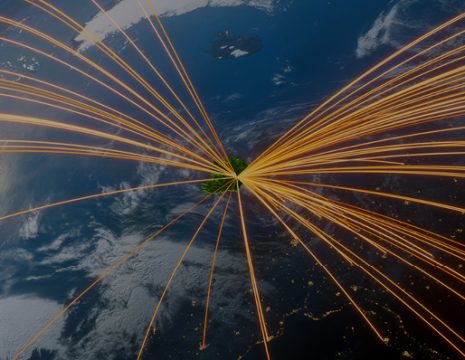 A section of the globe with orange lines, depicting trade and investment, going in and out of Ireland. It was used one the cover of our Pre-Budget 2026 submission.