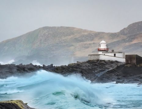 Valentia Lighthouse during stormy weather. It is the cover image for Annual Conference 2026.